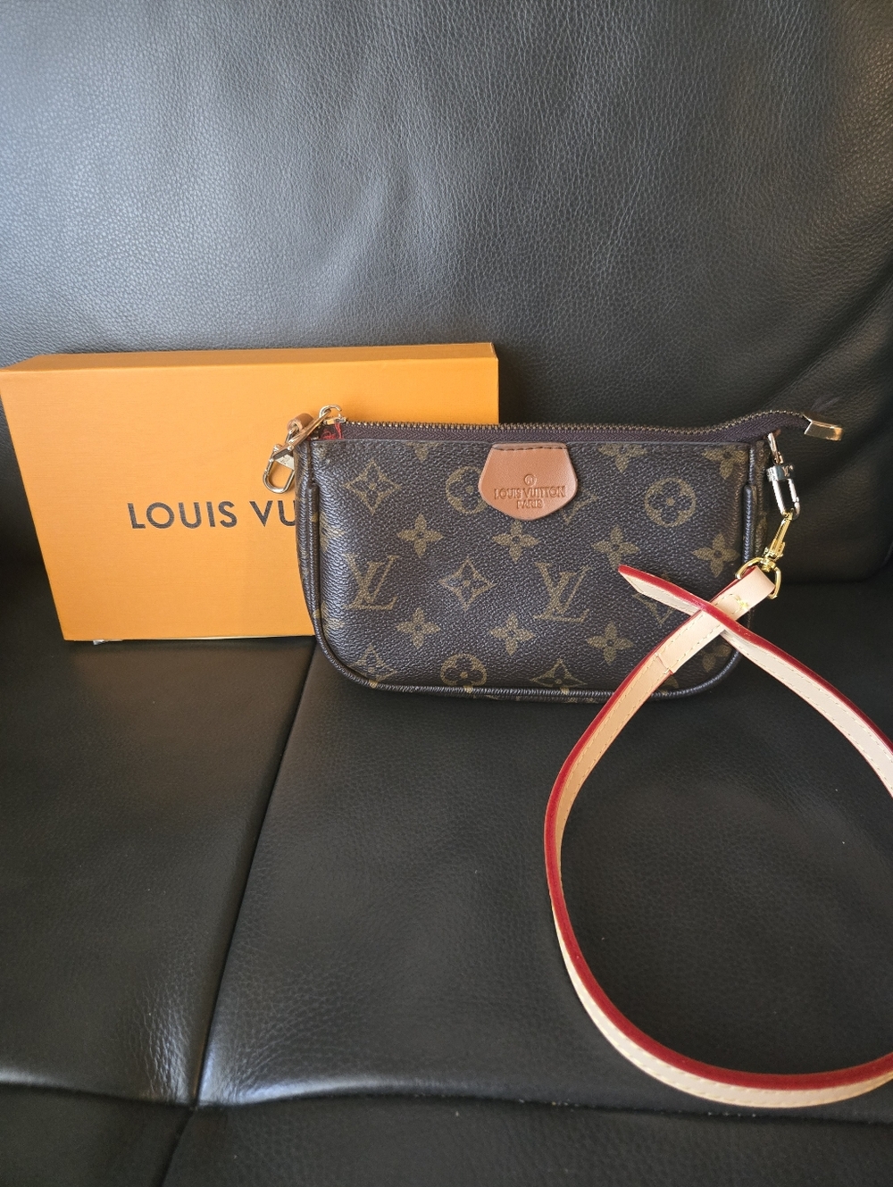 Monogram Mini Pouch Wristlet